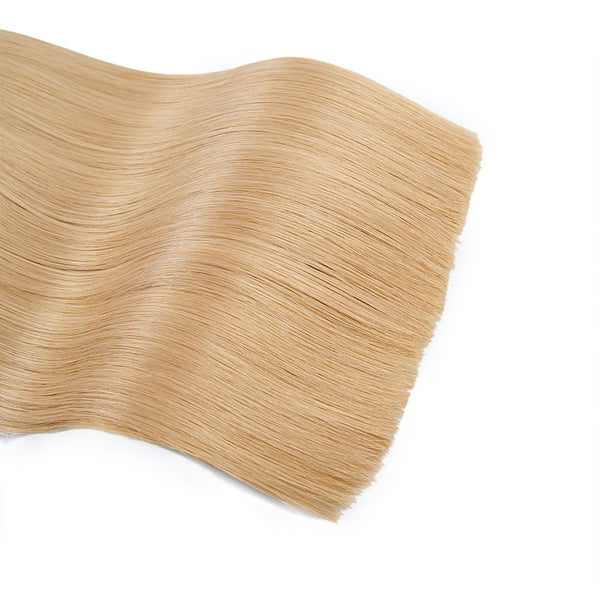 Strawberry Blonde Tape In Remy Hair Extensions